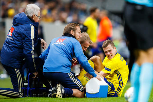 Viktor Claesson of Sweden is in pain