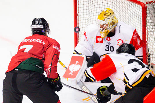 Pathrik Westerholm of Frölunda and goalkeeper Elvis