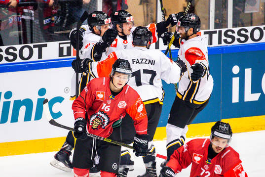 Alessio Bertaggia of Lugano celebrates with teammates