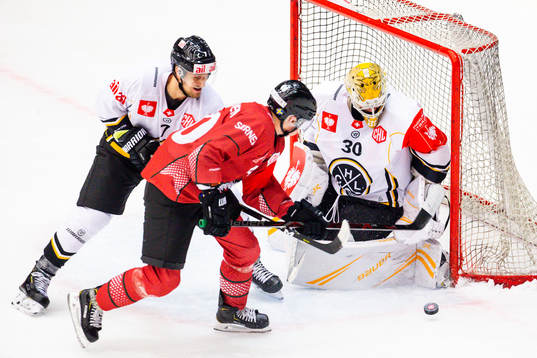 Joel Mustonen of Frölunda and goalkeeper Elvis Merzlikins