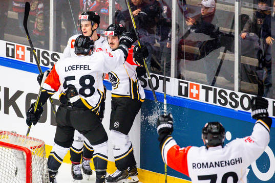 Alessio Bertaggia of Lugano celebrates with teammates