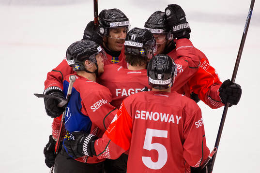 Linus Fagemo celebrates scoring 4-4 with team mates Joel