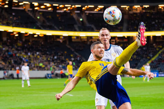 Marcus Berg of Sweden and Vladislav Ignatyev of Russia