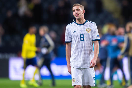Iury Gazinsky of Russia looks dejected