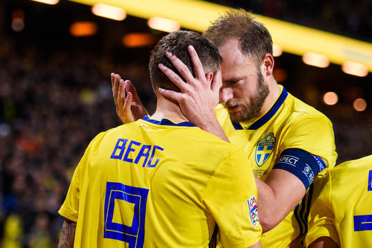 Marcus Berg and Andreas Granqvist of Sweden celebrates
