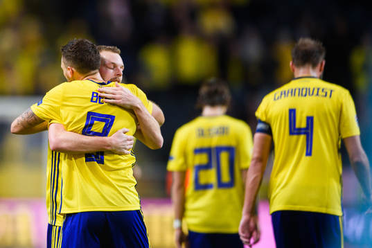 Marcus Berg and Sebastian Larsson of Sweden celebrates