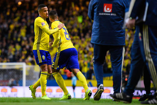 Martin Olsson and Isaac Kiese Thelin of Sweden