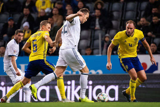 Ludwig Augustinsson and Andreas Granqvist of Sweden are
