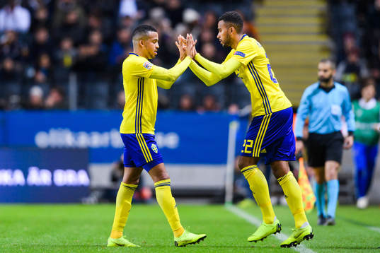 Martin Olsson and Isaac Kiese Thelin of Sweden