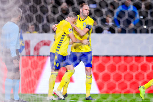 Andreas Granqvist and Marcus Berg of Sweden celebrates