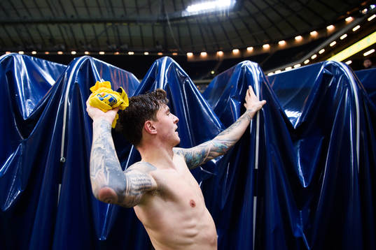 Victor Nilsson Lindelöf of Sweden gives away his shirt
