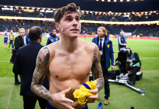Victor Nilsson Lindelöf of Sweden gives away his shirt
