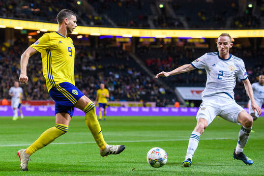 Marcus Berg of Sweden and Vladislav Ignatyev  of Russia