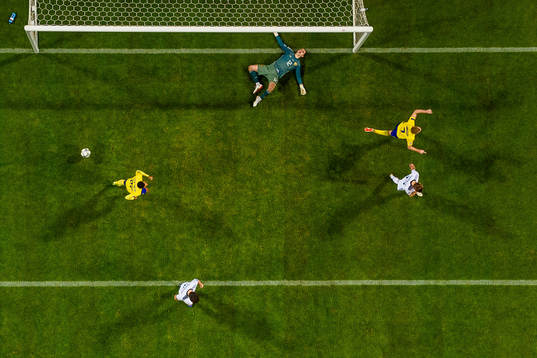 Goalkeeper Andrei Lunev of Russia looks dejected