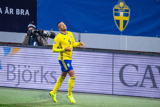 Martin Olsson of Sweden looks dejected