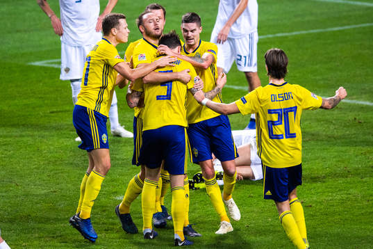 Andreas Granqvist and Mikael Lustig celebrates with Victor