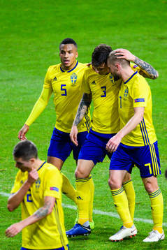 Martin Olsson and John Guidetti celebrates with Victor