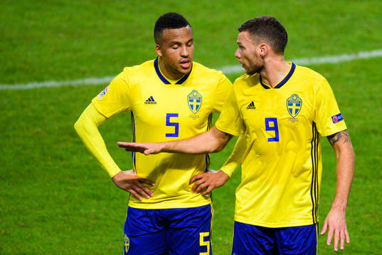 Martin Olsson and Marcus Berg of Sweden