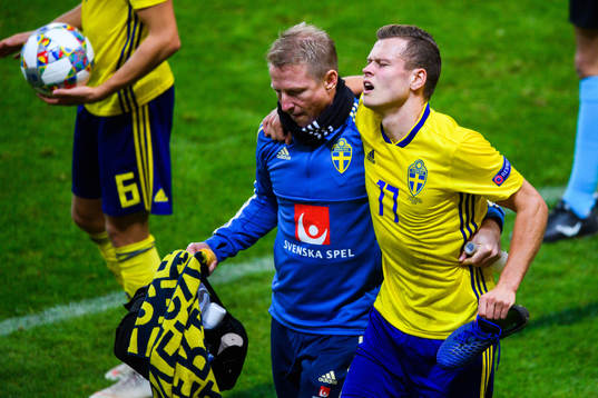 Viktor Claesson of Sweden in pain