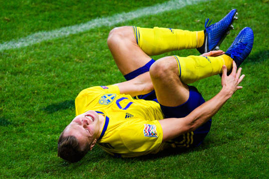 Viktor Claesson of Sweden in pain