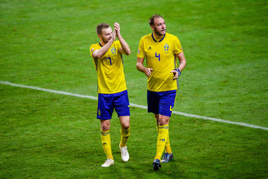 Sebastian Larsson and Andreas Granqvist of Sweden celebrates