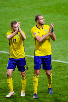 Sebastian Larsson and Andreas Granqvist of Sweden celebrates