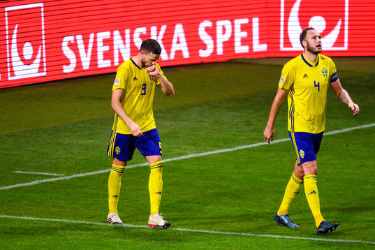 Marcus Berg of Sweden and Andreas Granqvist of Sweden