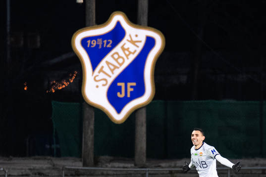Mustafa "Mos" Abdellaoue of Strømsgodset celebrates