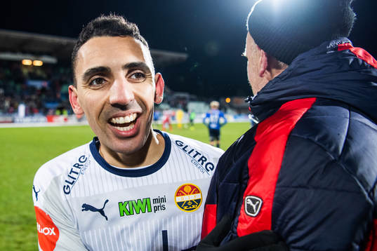 Mustafa "Mos" Abdellaoue of Strømsgodset celebrates