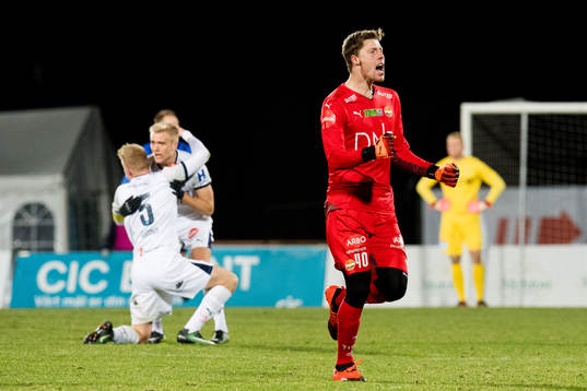 Goalkeeper Morten Sætra of Strømsgodset celebrates