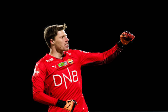 Goalkeeper Morten Sætra of Strømsgodset celebrates
