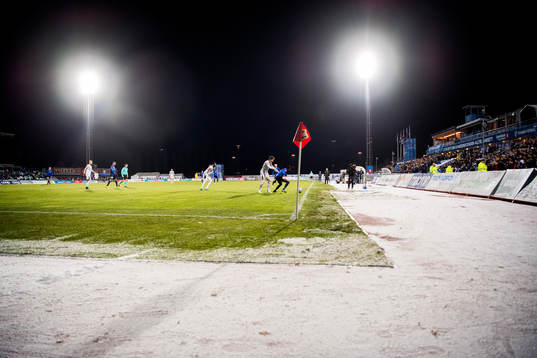 Snow along the pitch