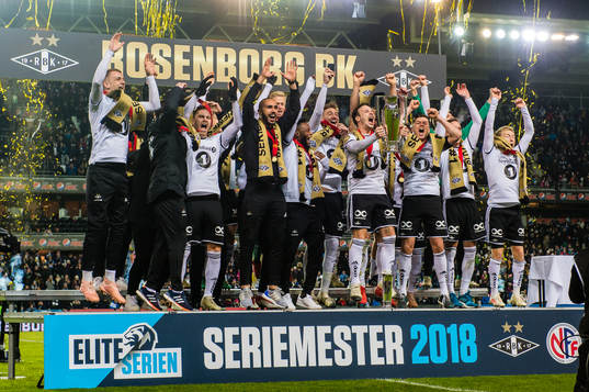 Players of Rosenborg celebrate winning the league