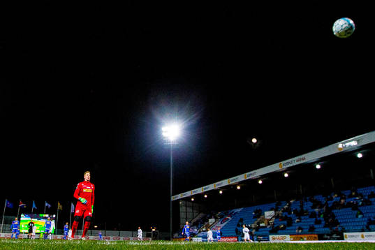 Goalkeeper Eirik Johansen of Sandefjord sees the ball hit