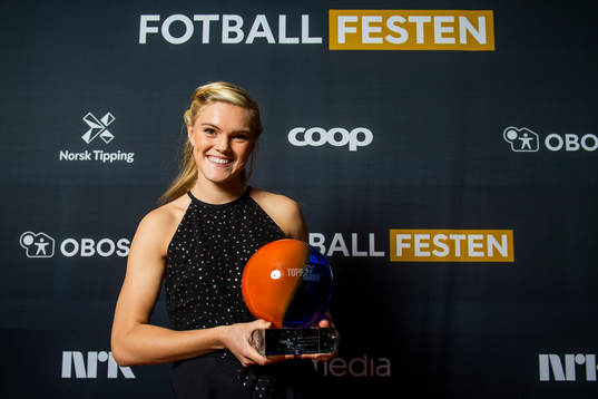 Kristine Leine of Røa poses for a portrait with the award
