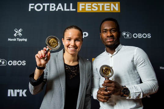 Franck Boli of Stabæk and Guro Reiten of LSK Kvinner pose