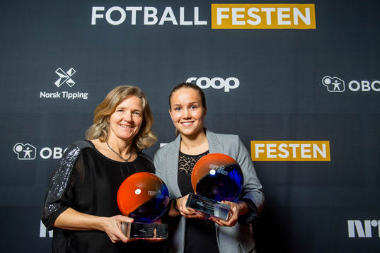 Hege Riise and Guro Reiten of LSK Kvinner pose with the