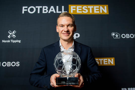 Jon Helge Tveita of Sarpsborg 08 poses with the prize for