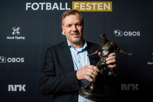 Kjetil Rekdal of Start poses for a portrait with the award