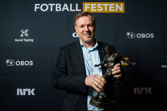Kjetil Rekdal of Start poses for a portrait with the award