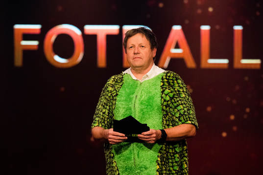 Bjarne Berntsen, coach of Viking, in a dinosaur costume