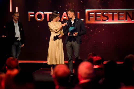 Goalkeeper André Hansen of Rosenborg is awarded the prize