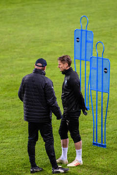 Head coach Uwe Rösler and Markus Rosenberg of Malmö FF