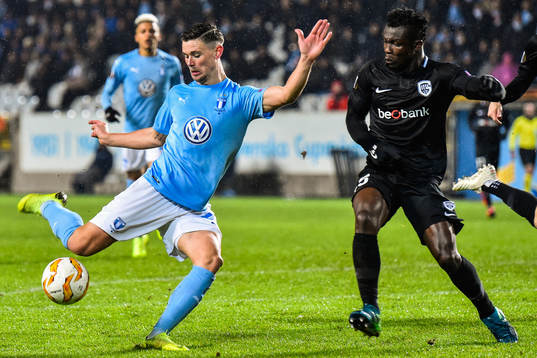 Marcus Antonsson of Malmö FF and Joseph Aidoo of Genk