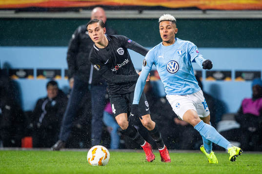 Dries Wouters of Genk and Romain Gall of Malmö FF