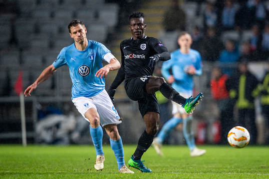 Markus Rosenberg of Malmö FF and Joseph Aidoo of Genk
