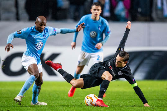 Fouad Bachirou of Malmö FF and Alejandro Pozuelo of Genk