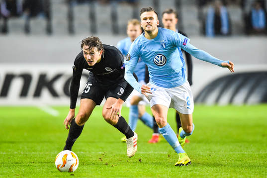 Sander Berge of Genk and Arnór Ingvi Traustason of Malmö