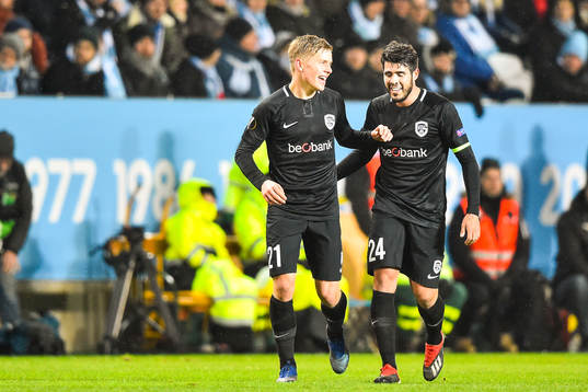 Jere Uronen and Alejandro Pozuelo of Genk celebrates