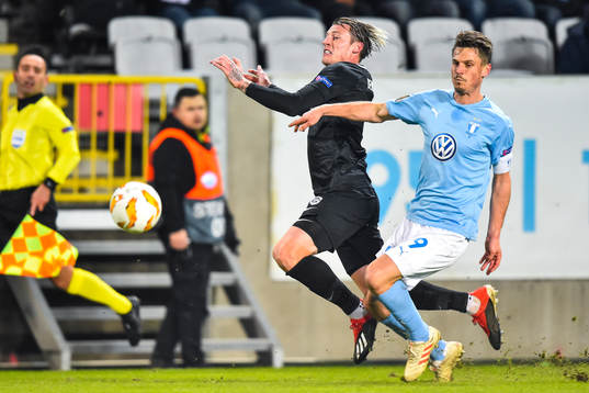 Sebastien Dewaest of Genk and Markus Rosenberg of Malmö FF